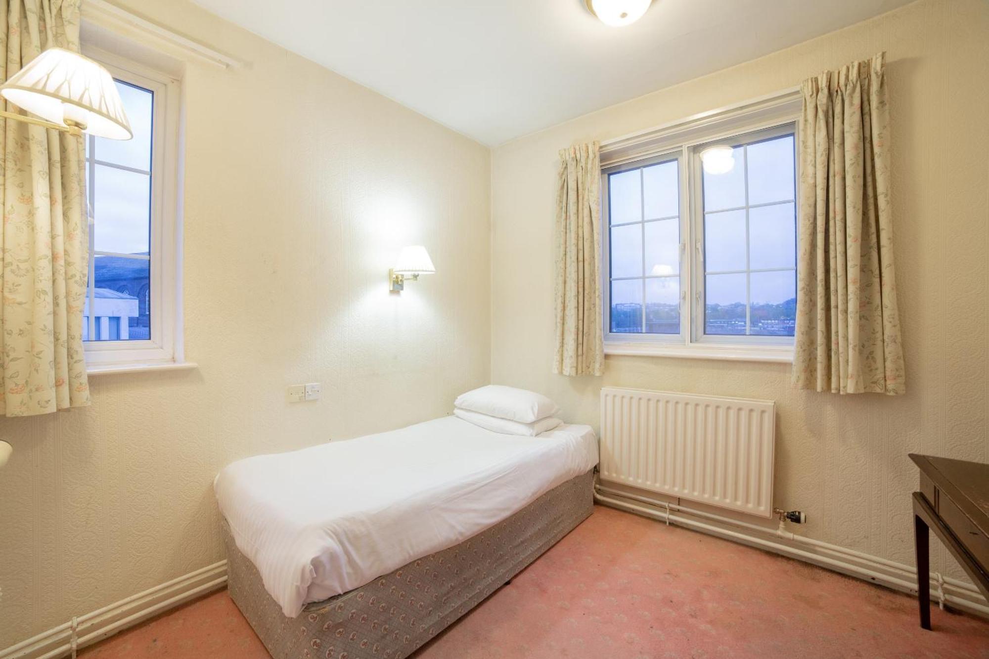 Single Room with Shared Shower and Toilet