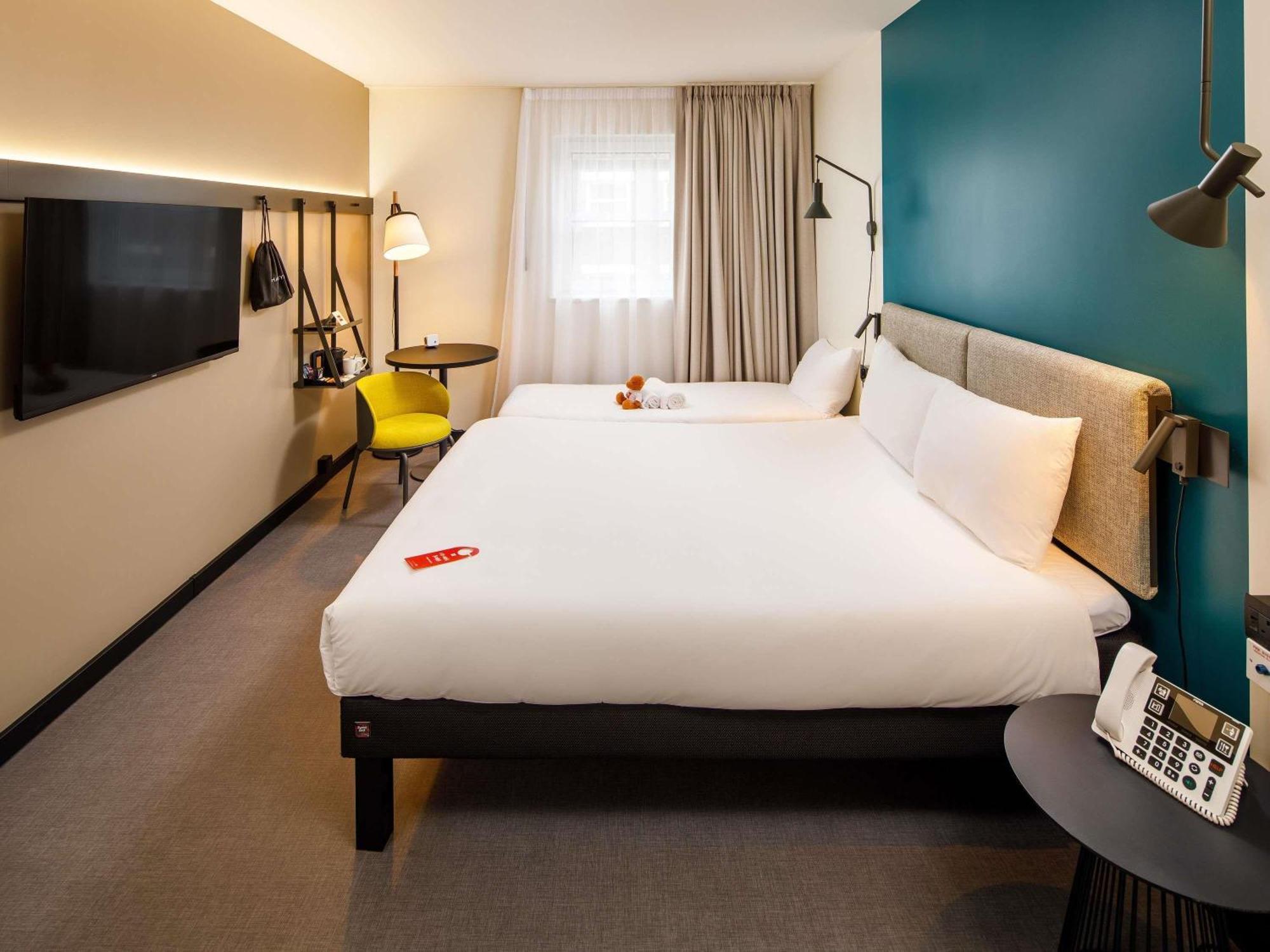 family room with one double and one single bed,1730013556:JPEG