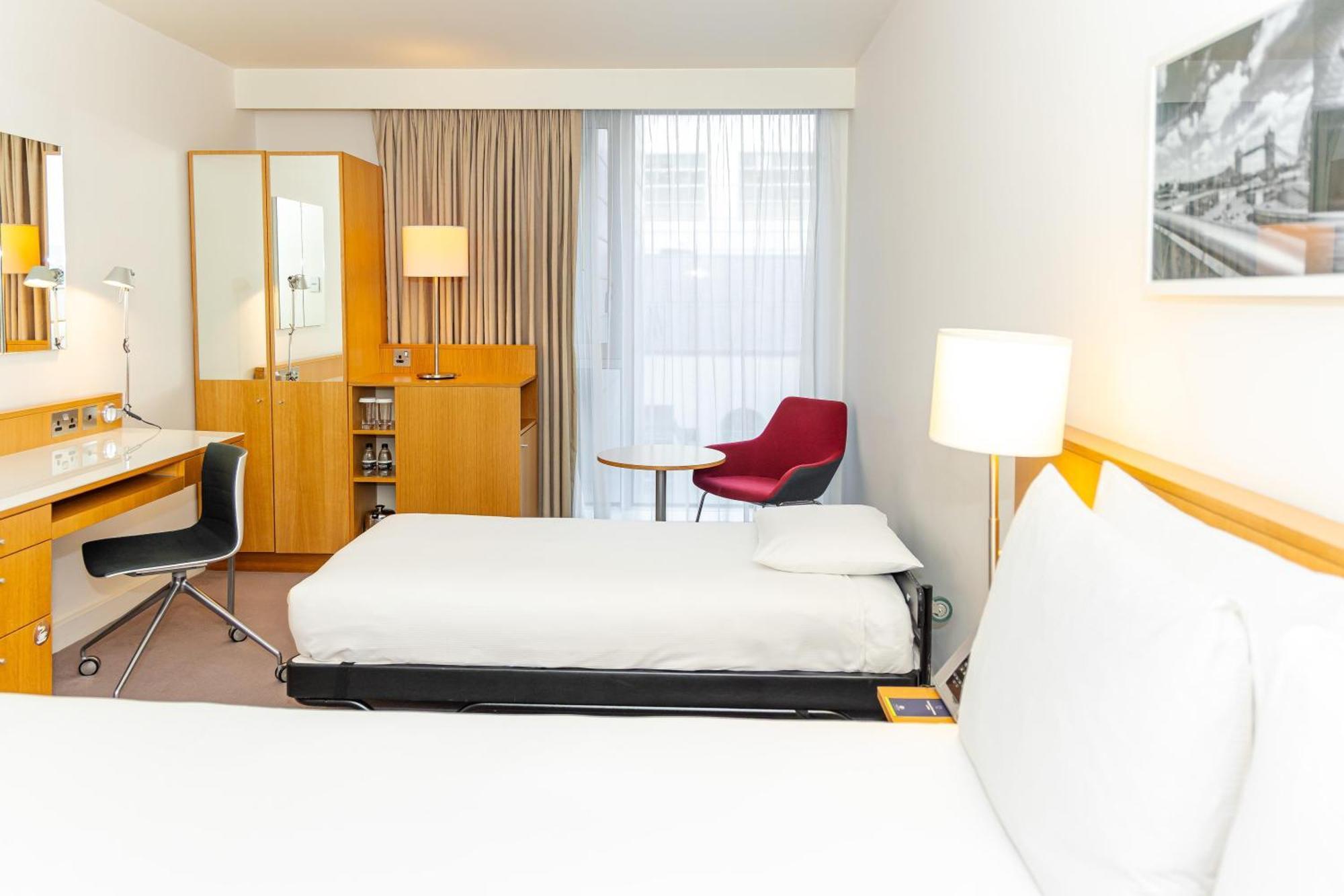 Queen Room with One Single Roll-Away Bed