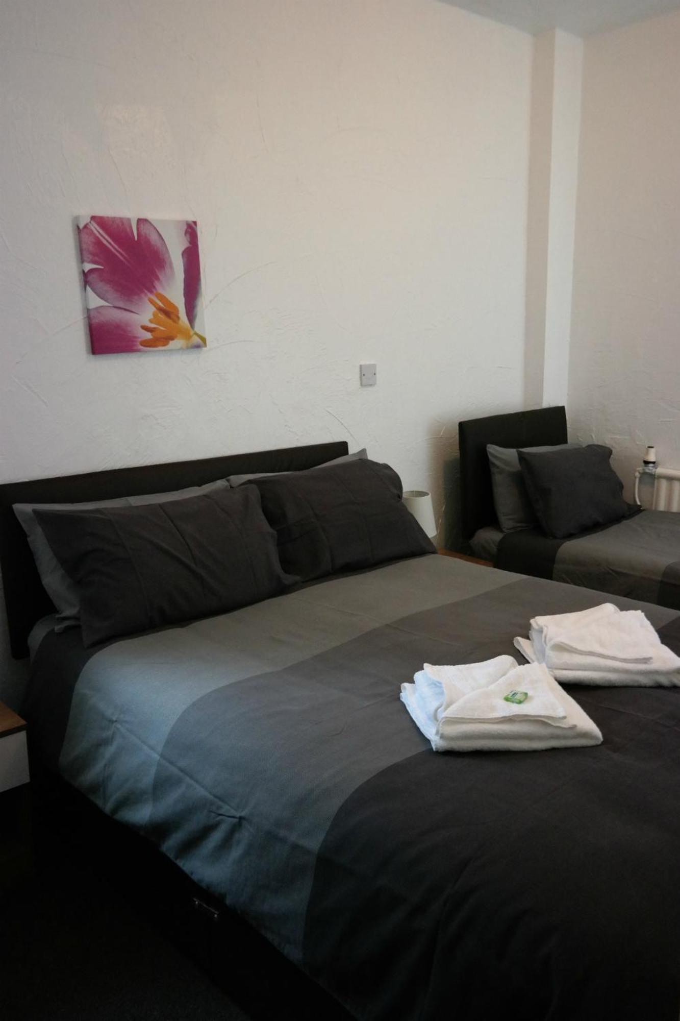 Deluxe Triple Room,140194860:JPEG